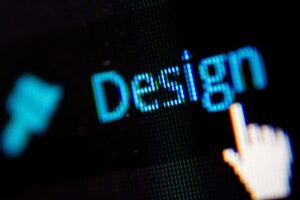 Screen displays the word "Design" in a black background