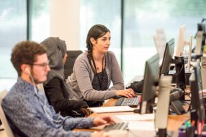 People sitting at computers in a lab